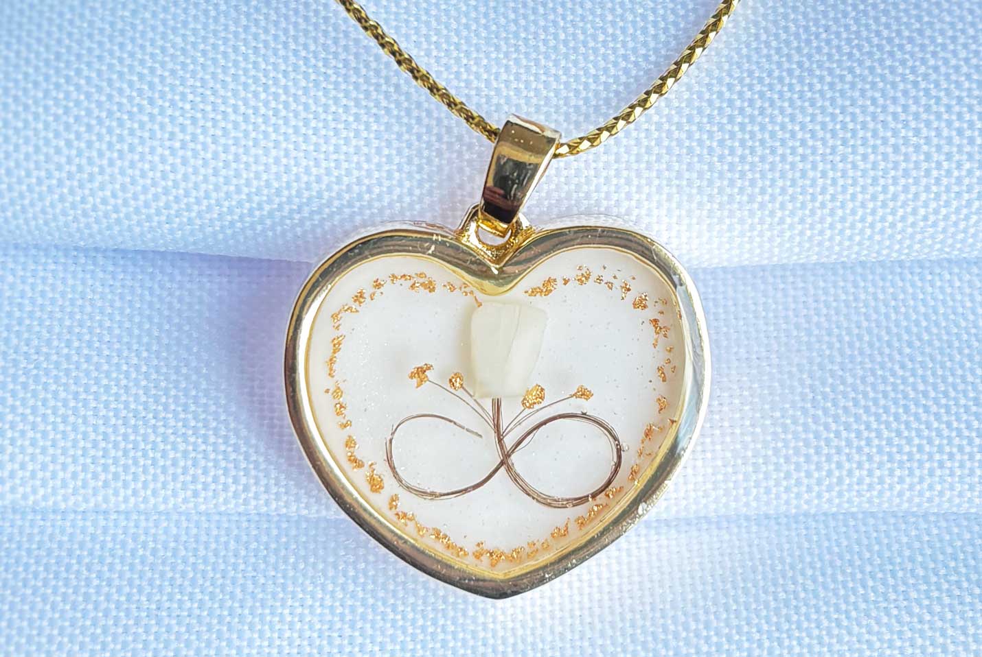 joia Afetiva com dente de leite